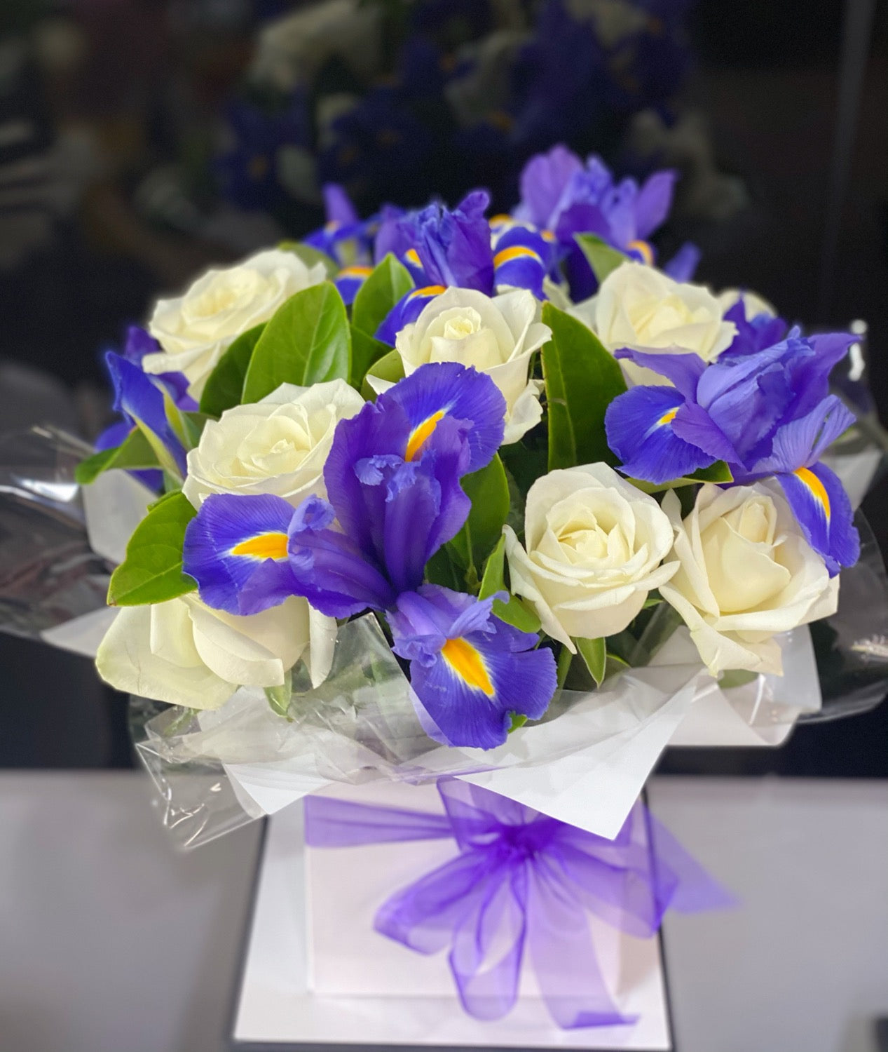 Elegancy (white rose and blue iris box) - Vermont Florist