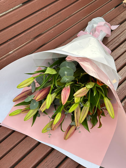 Asiatic lily bunch with seasonal greens - Vermont Florist