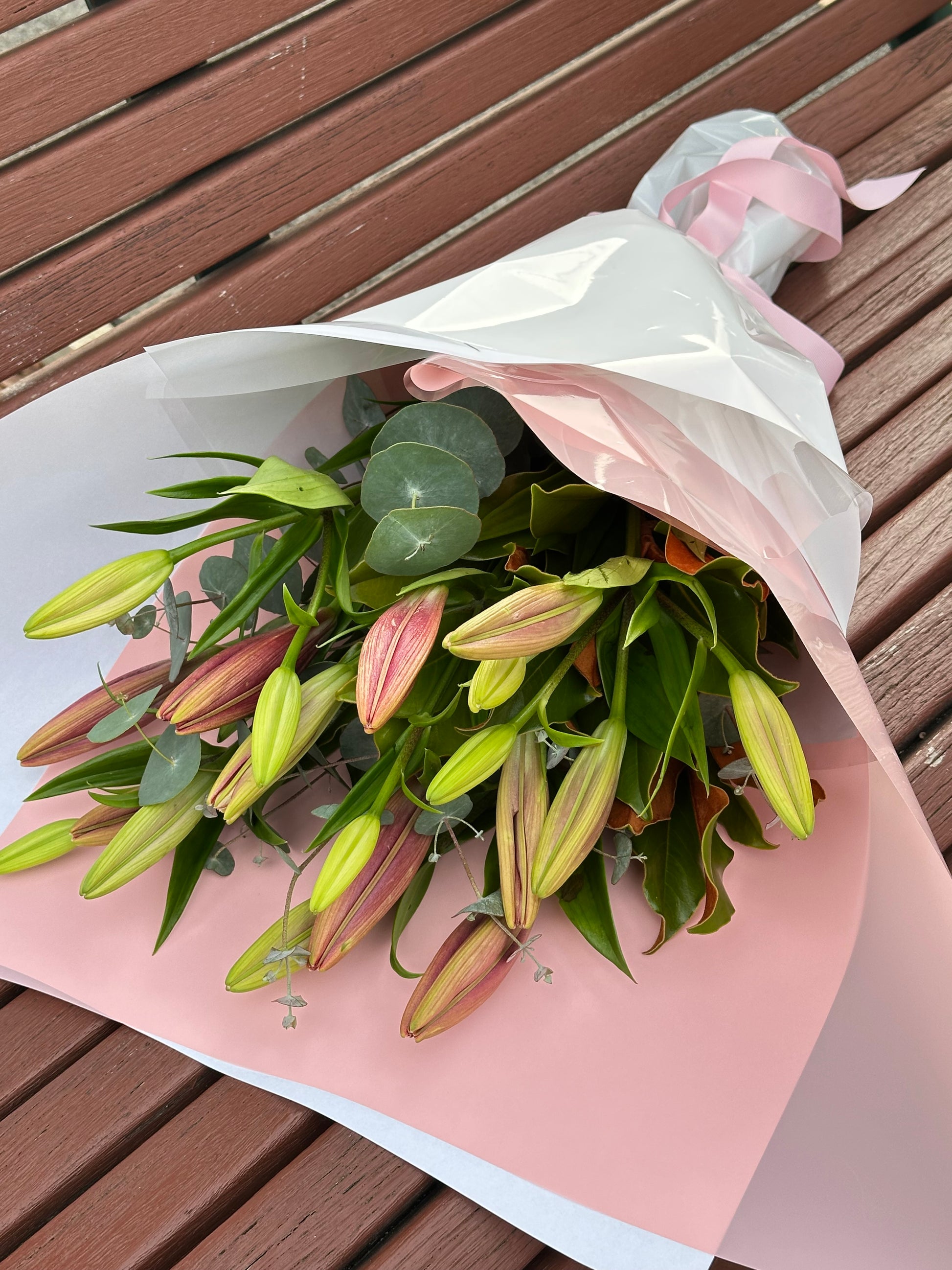 Asiatic lily bunch with seasonal greens - Vermont Florist