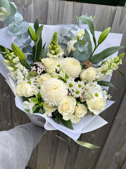 Deluxe size white sympathy bouquet