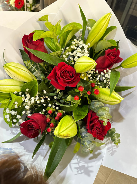 Christmas red rose and white lily bouquet