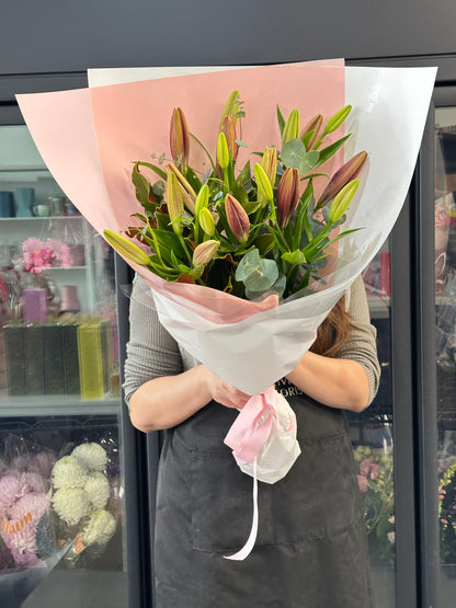 Asiatic lily bunch with seasonal greens - Vermont Florist