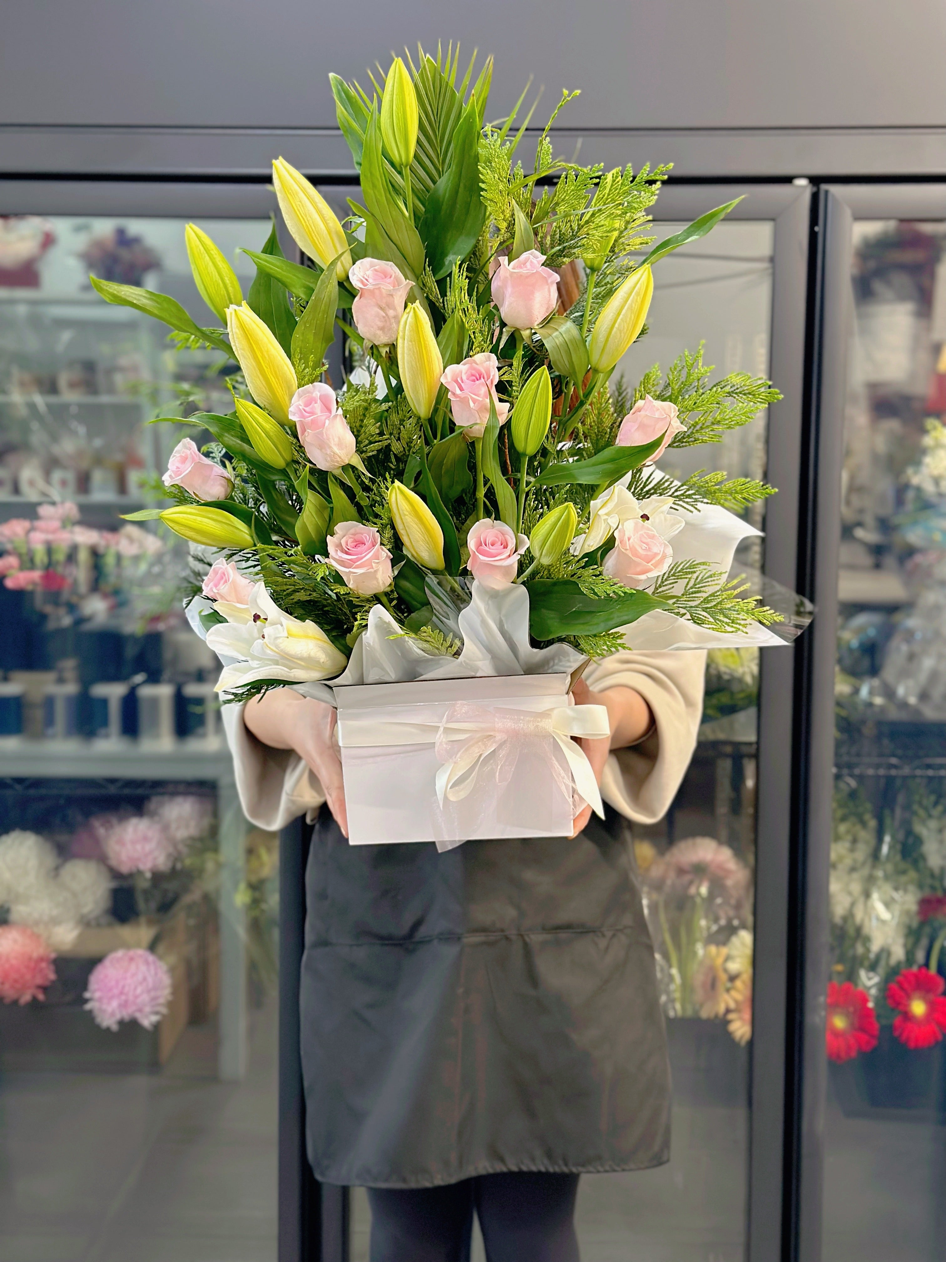 Blushing pink rose and white oriental lily arrangement - Vermont Florist