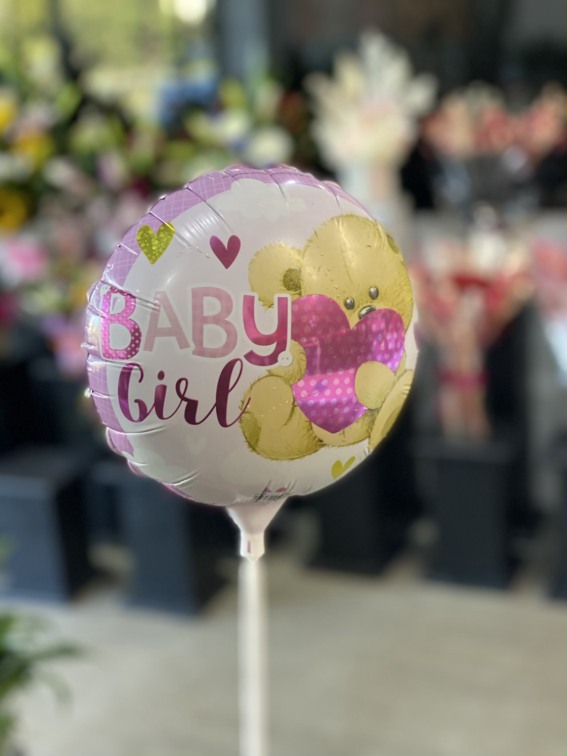 Baby girl stick ballon to go with flowers - Vermont Florist