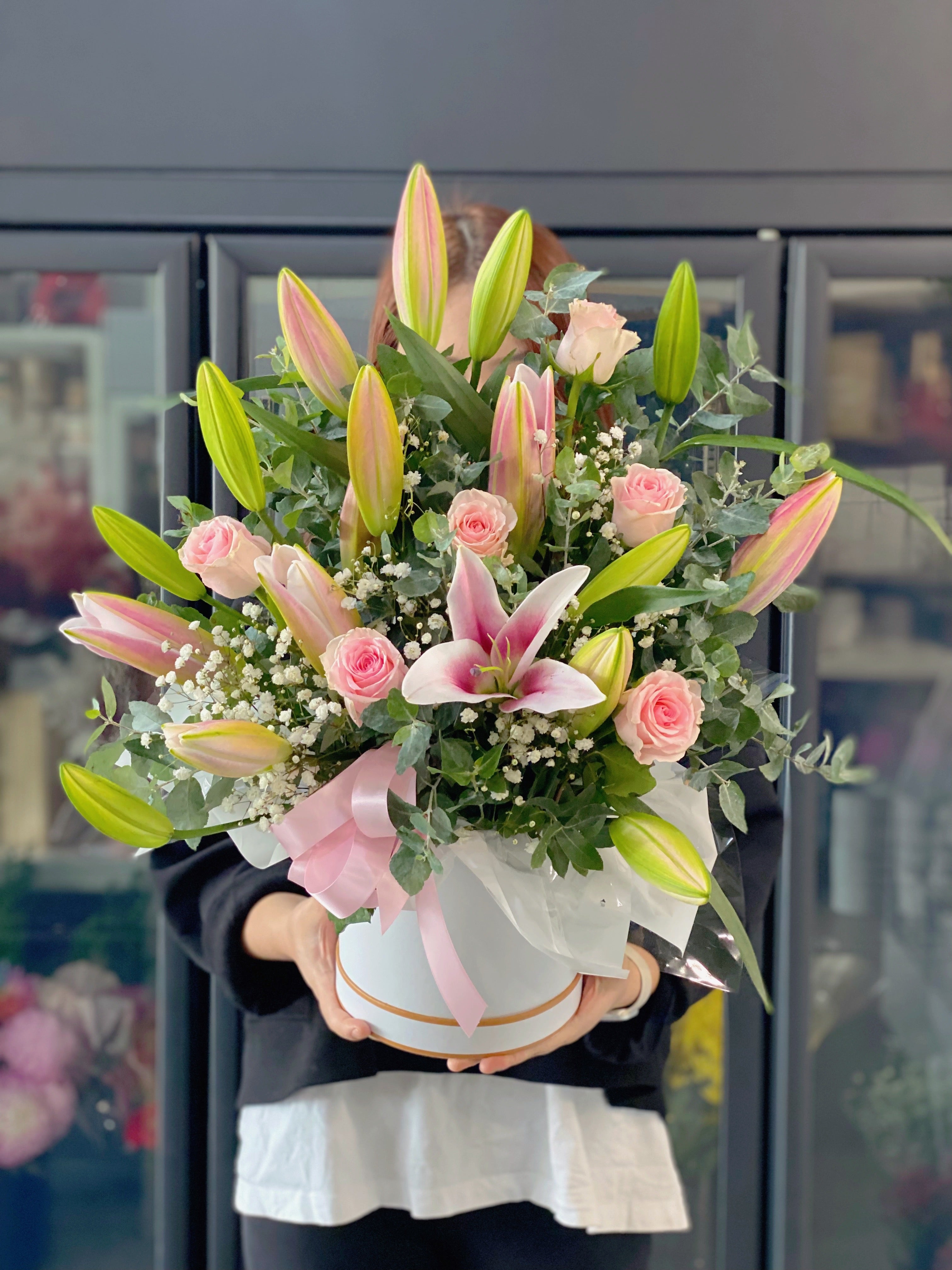Scented pink oriental lily and rose hat box arrangement - Vermont Florist