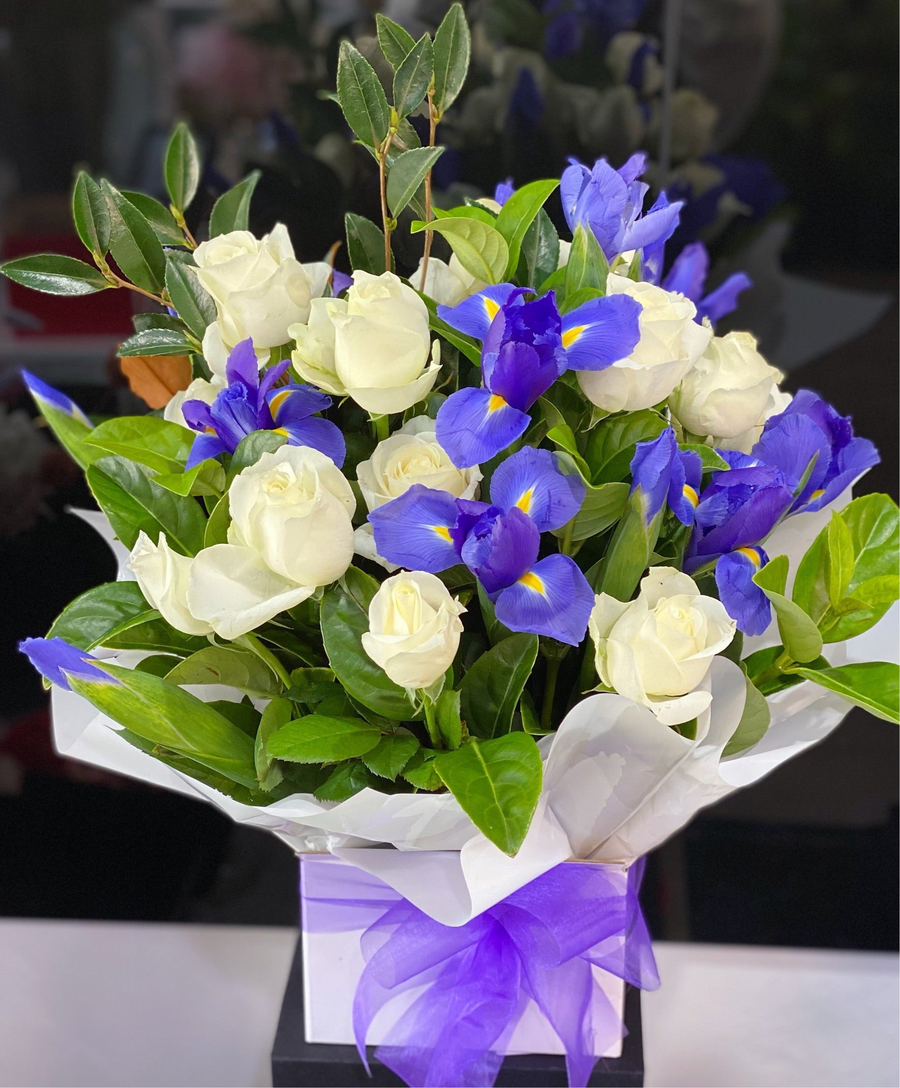 Elegancy (white rose and blue iris box) - Vermont Florist